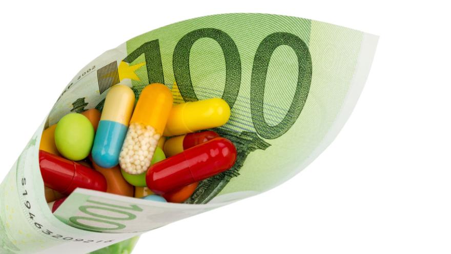Geldschein und Tabletten