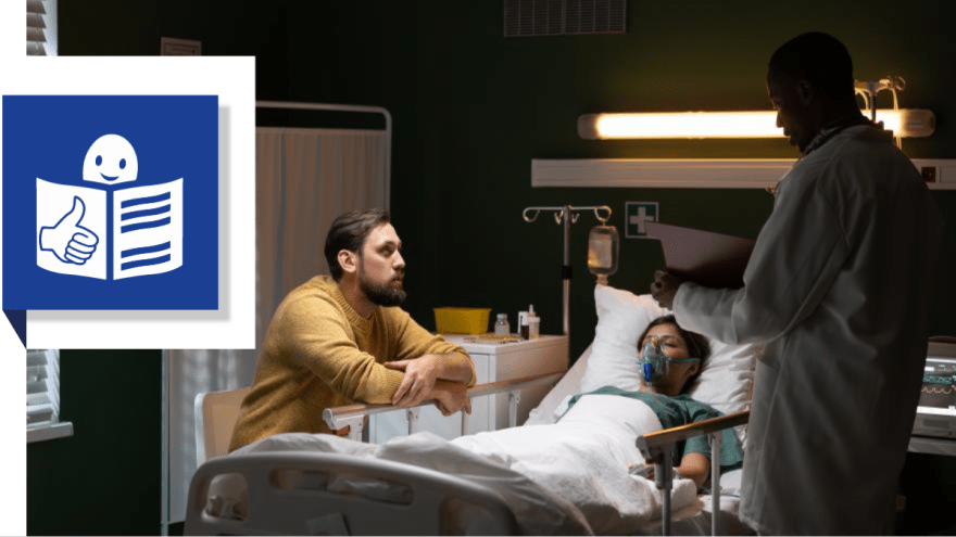 Ehemann am Krankenhausbett seiner Frau, die nicht ansprechbar ist