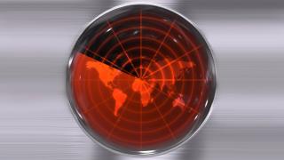 Weltkarte unter rotem Radarschirm.